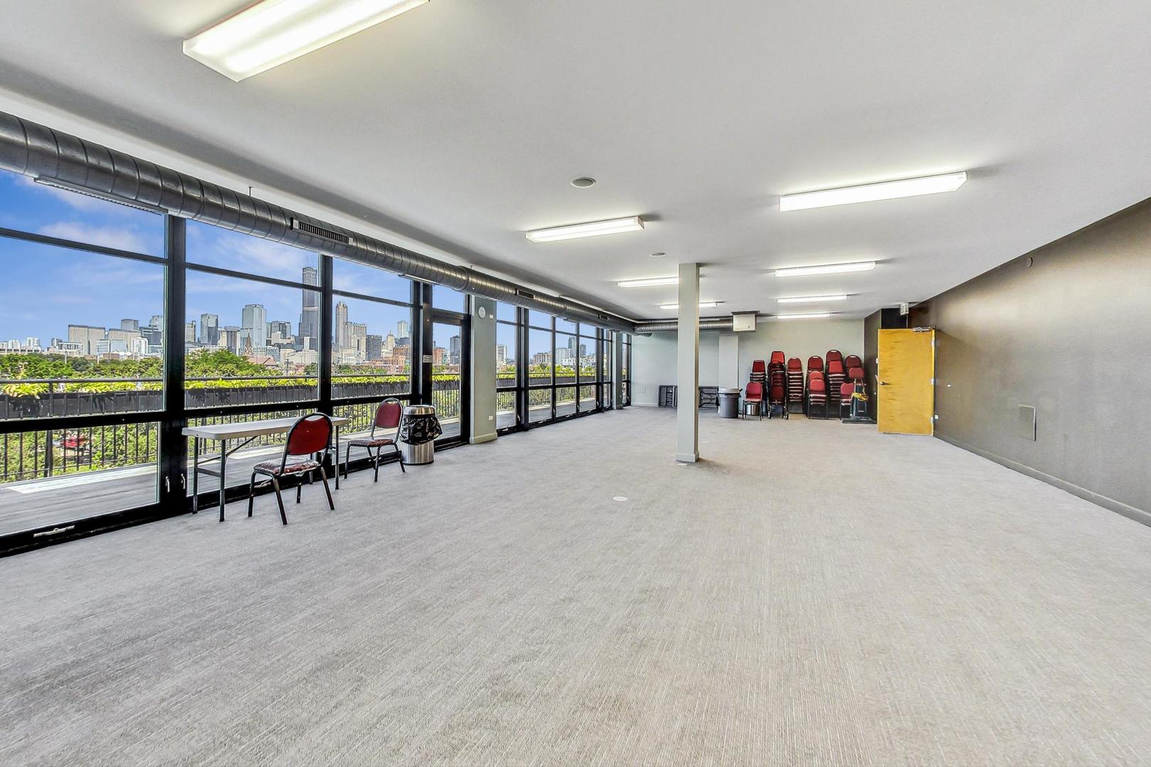 1001 West 15th Street, Unit 241 Chicago, IL 60608 - Photo 36 of 41 a very nice looking room with a large window