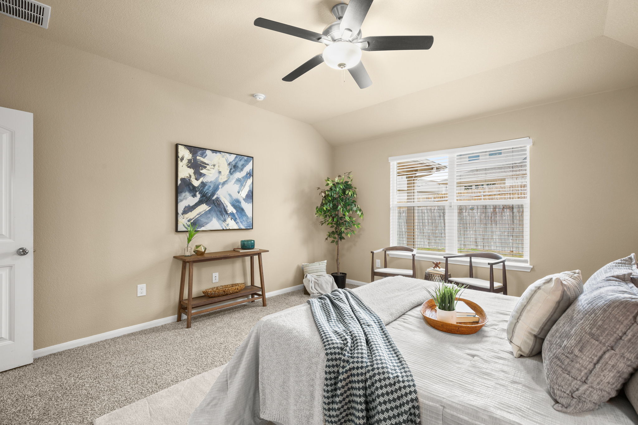 3100 Crystal Bend Drive Pflugerville, TX 78660 - Photo 16 of 32 Carpeted bedroom featuring vaulted ceiling and a ceiling fan