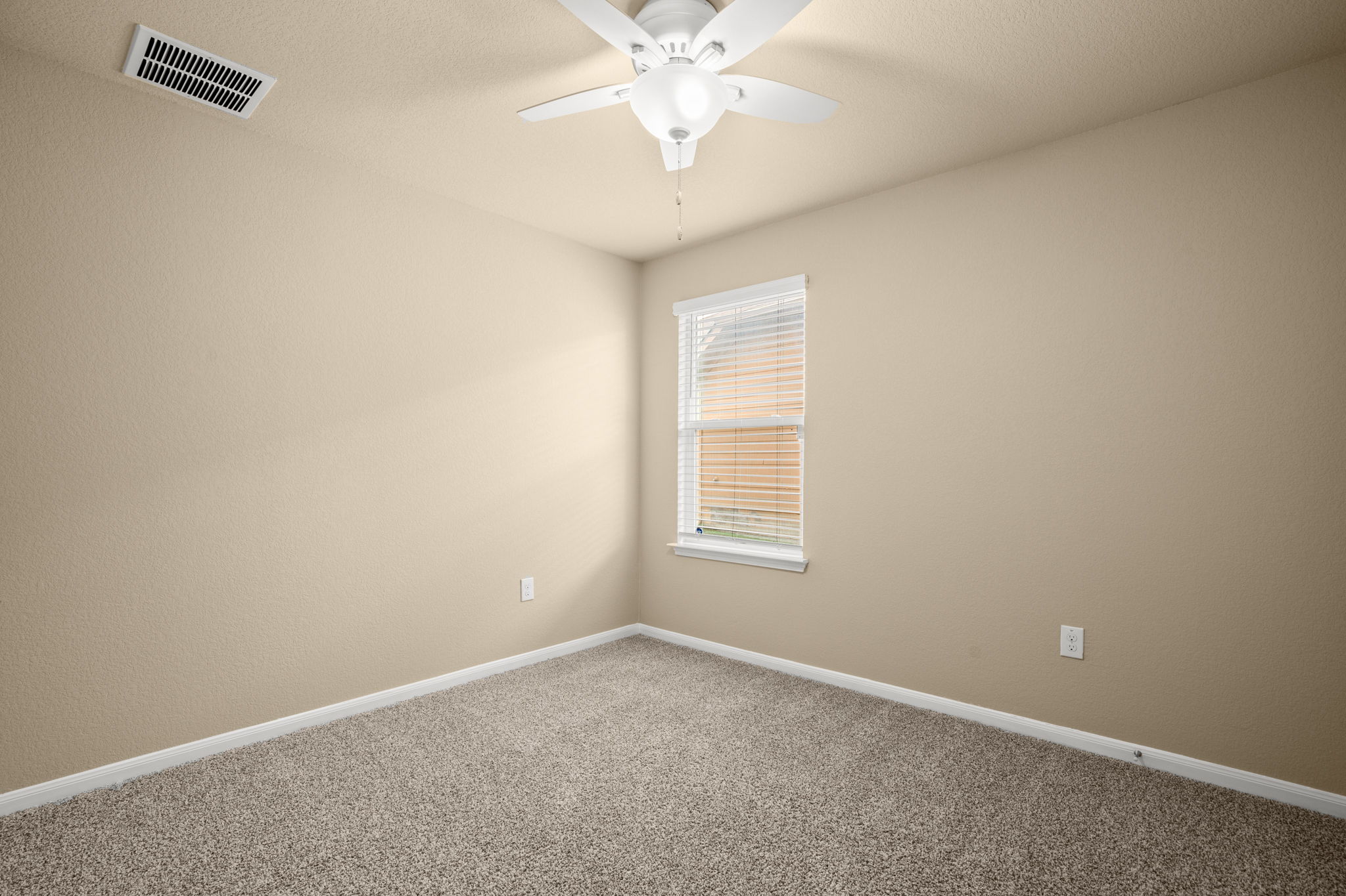 3100 Crystal Bend Drive Pflugerville, TX 78660 - Photo 20 of 32 Carpeted spare room featuring baseboards and a ceiling fan