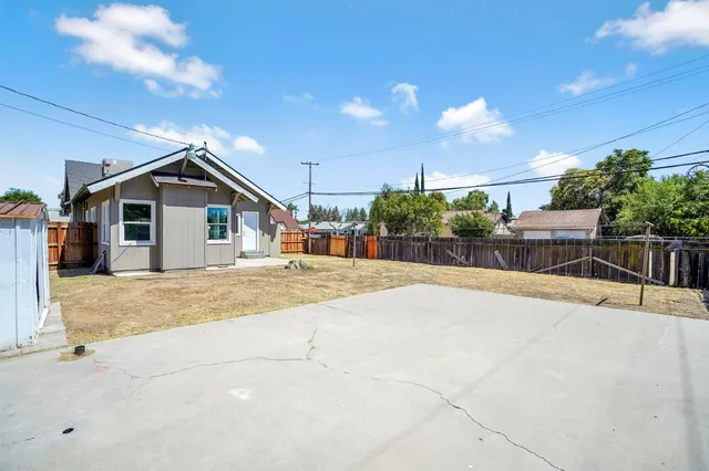 a view of a house with a patio