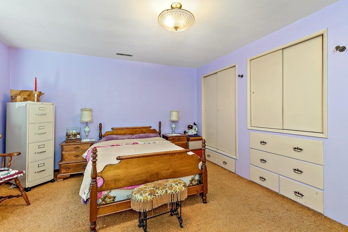 2384 Camp Baker Road Medford, OR 97501 - Photo 10 of 35 a bedroom with a bed and furniture
