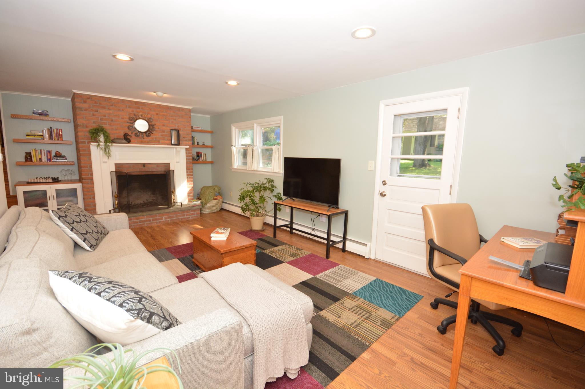 19 Wolf Road Akron, PA 17501 - Photo 7 of 42 Family Room w/Wood Burning Stove
