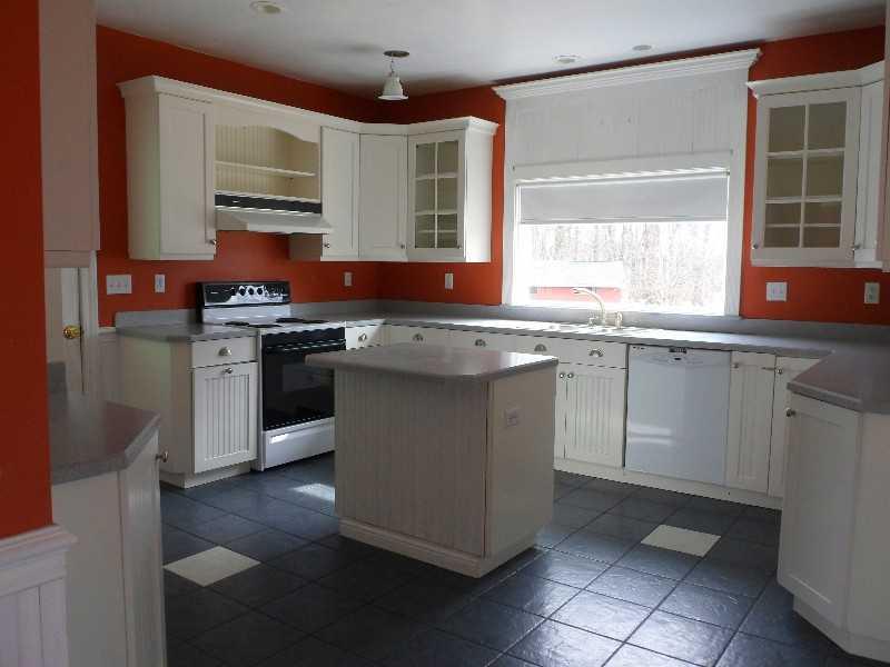 7 Kinsman Road Greenville, PA 16125 - Photo 2 of 19 Kitchen. Lots of cabinet/storage space in this new kitchen, appliances included are elec stove and dishwasher, island. Ceramic floor. Lots of natural light throughout the home. Recessed lighting.