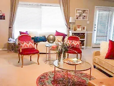 a view of a dining room with furniture