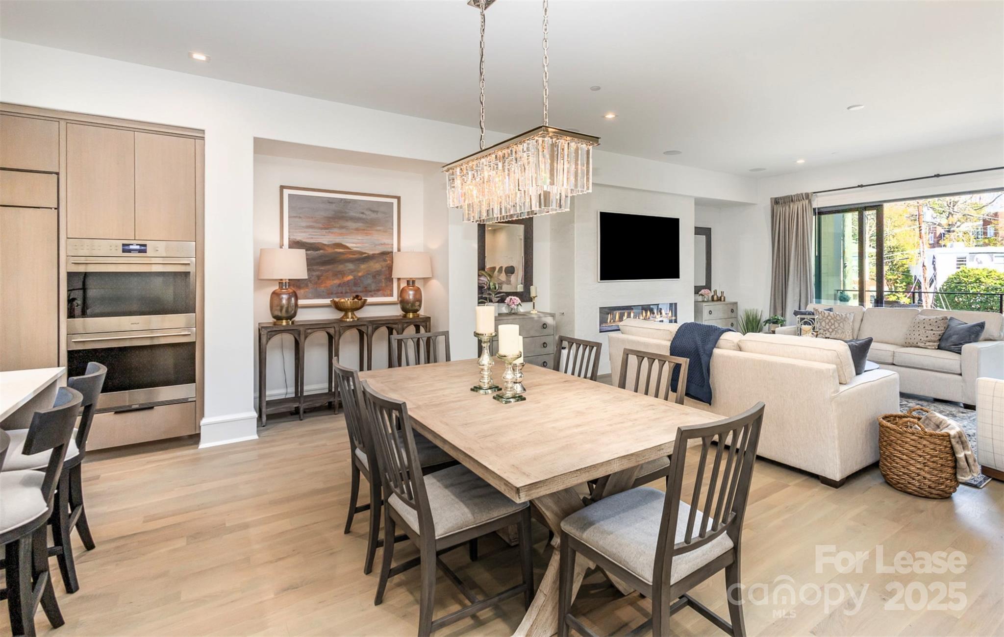 616 Queens Road Charlotte, NC 28204 - Photo 11 of 36 a view of a dining room with furniture window and outside view