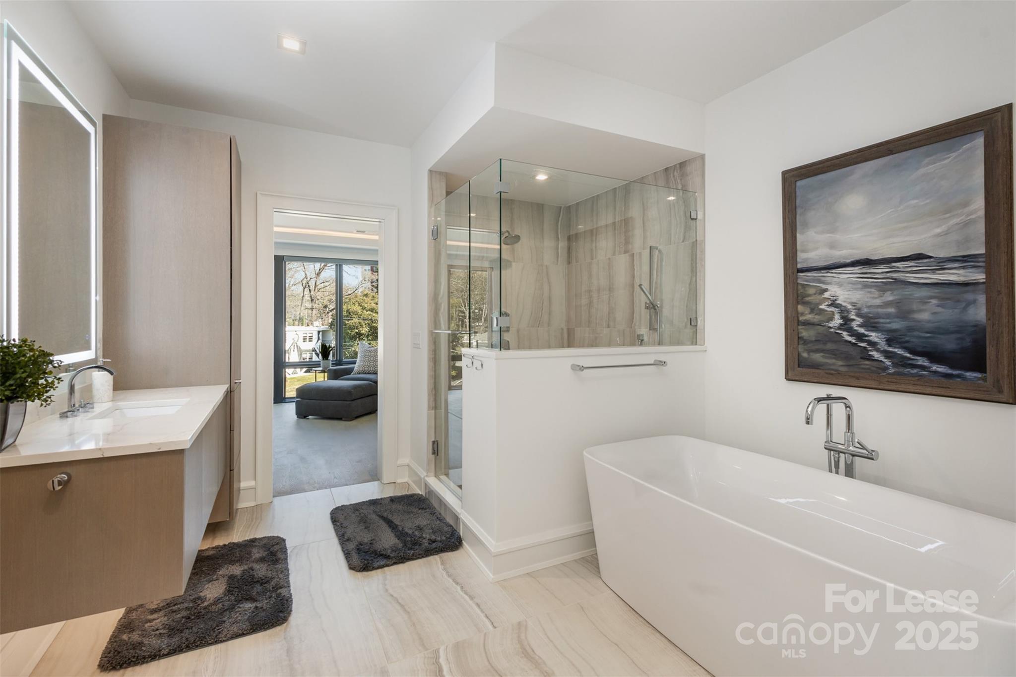 616 Queens Road Charlotte, NC 28204 - Photo 26 of 36 a bathroom with a tub sink and mirror