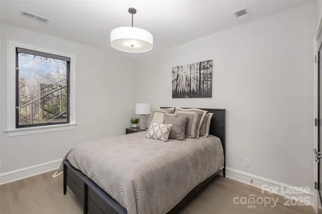 a view of a terrace with couches and a fire pit