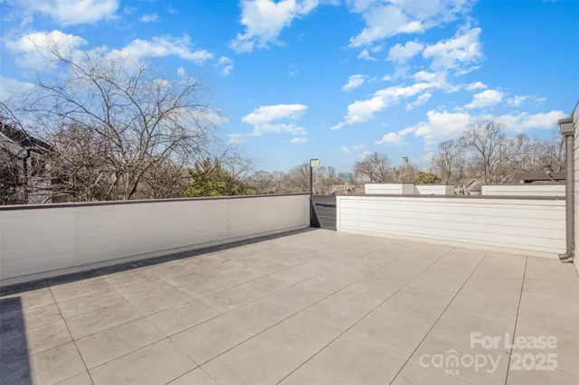 a view of a brick building with many windows