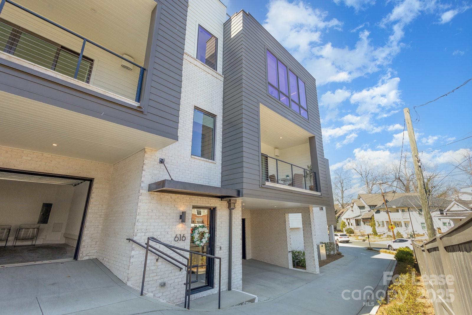 616 Queens Road Charlotte, NC 28204 - Photo 36 of 36 a view of a brick building with many windows
