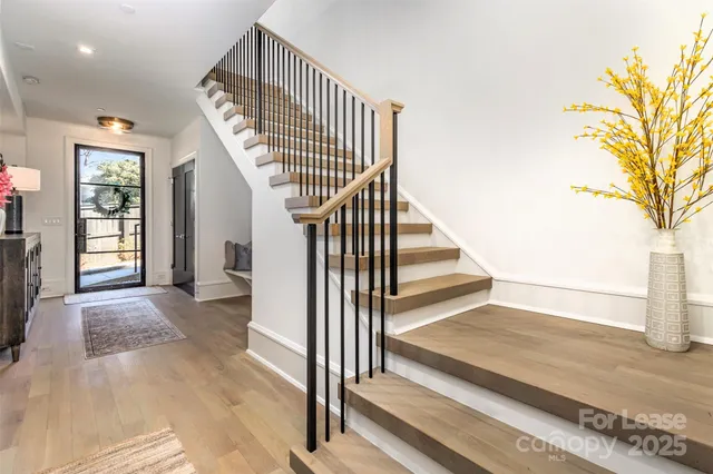 a view of a hallway with staircase