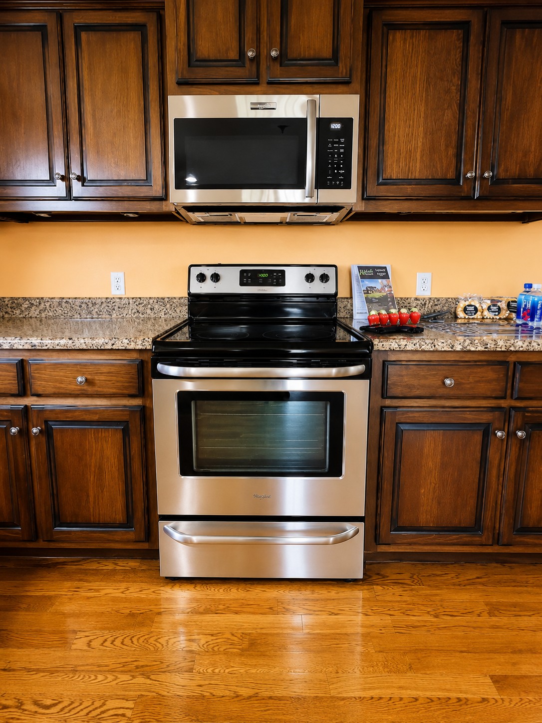 663 Jackson Road Portland, TN 37148 - Photo 11 of 32 a kitchen with wooden cabinets and stainless steel appliances