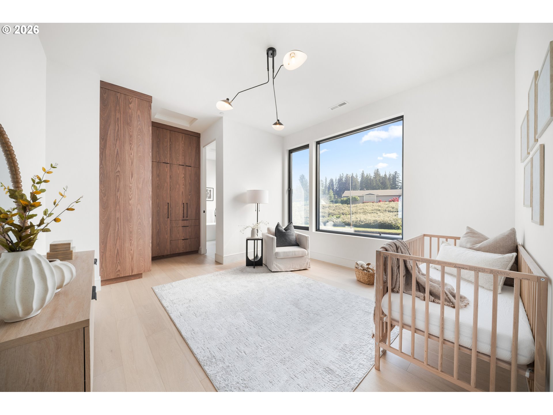 4541 Northwest 71st Avenue Camas, WA 98607 - Photo 29 of 48 a bedroom with furniture and a large window