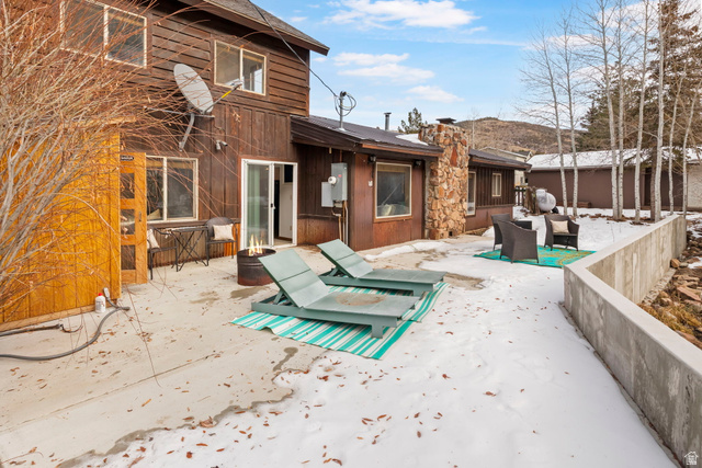 2189 Samak Park Loop, Unit 43 Kamas, UT 84036 - Photo 45 of 48 Expansive concrete patio area offering direct access to the interior via a sliding glass door