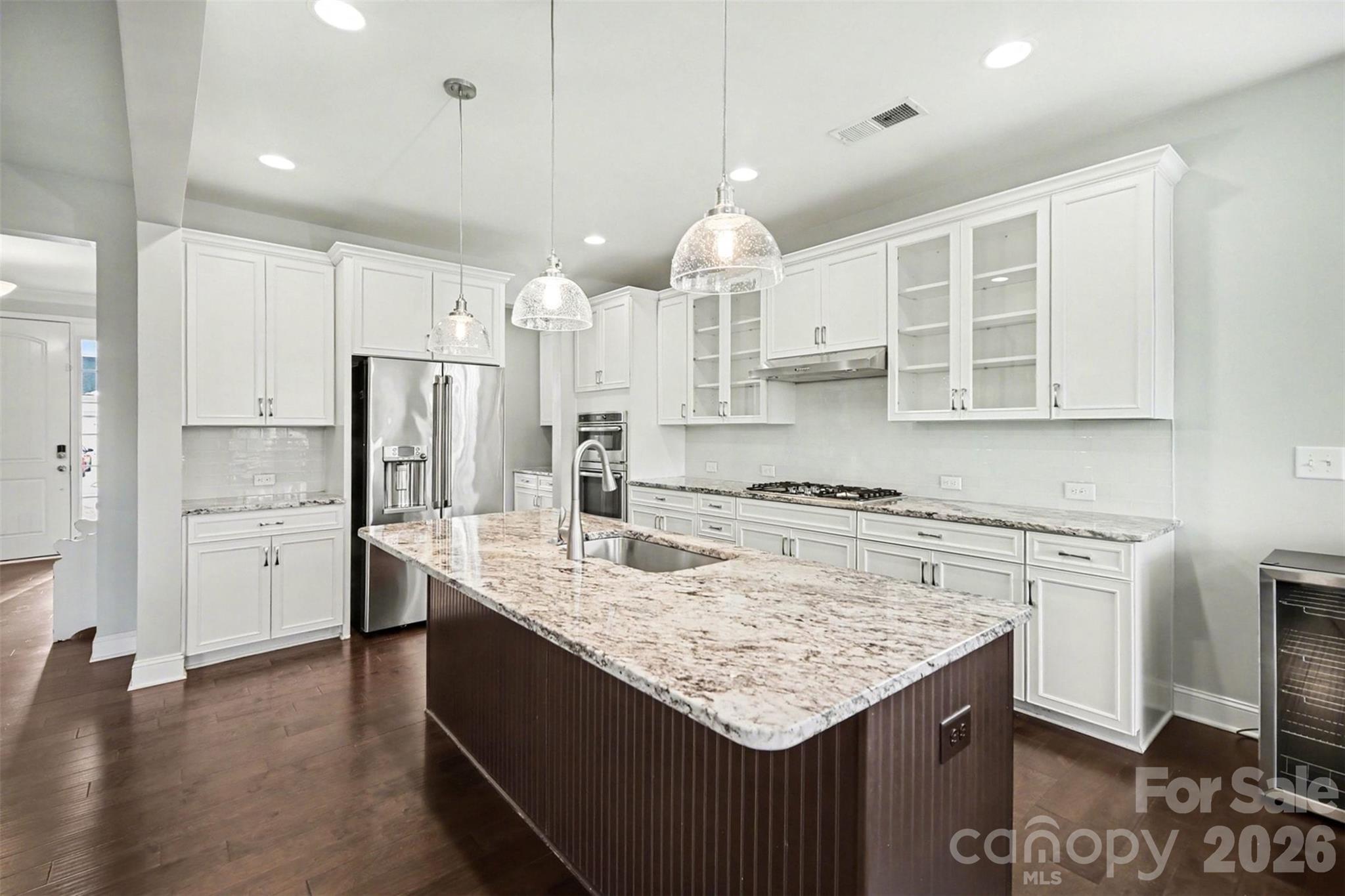7200 Irongate Drive Lancaster, SC 29720 - Photo 1 of 30 a kitchen with stainless steel appliances granite countertop a sink stove and refrigerator