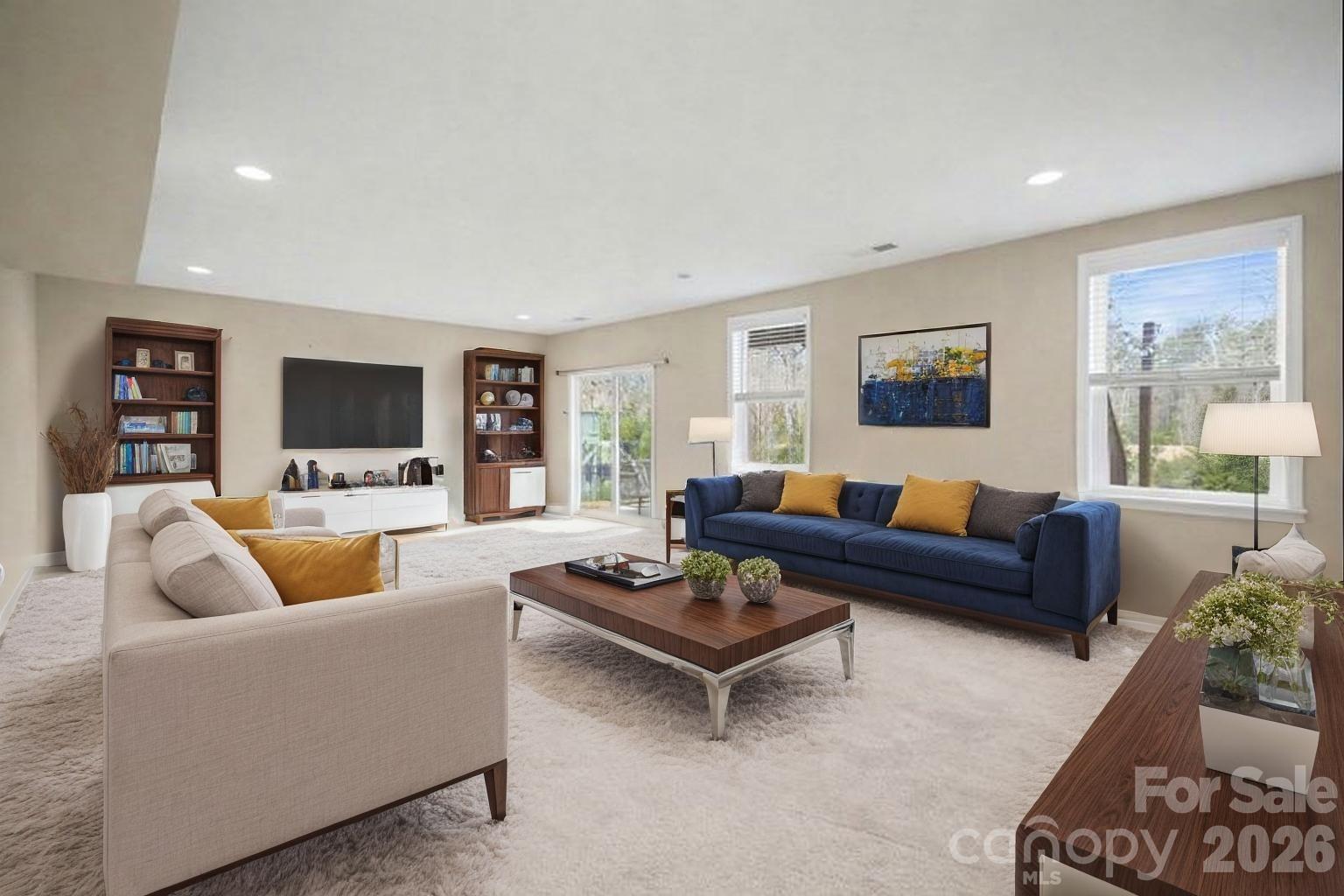 7200 Irongate Drive Lancaster, SC 29720 - Photo 21 of 30 a living room with furniture and a flat screen tv