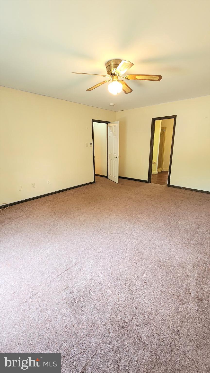 408 Deptford Road Glassboro, NJ 08028 - Photo 10 of 13 an empty room with windows