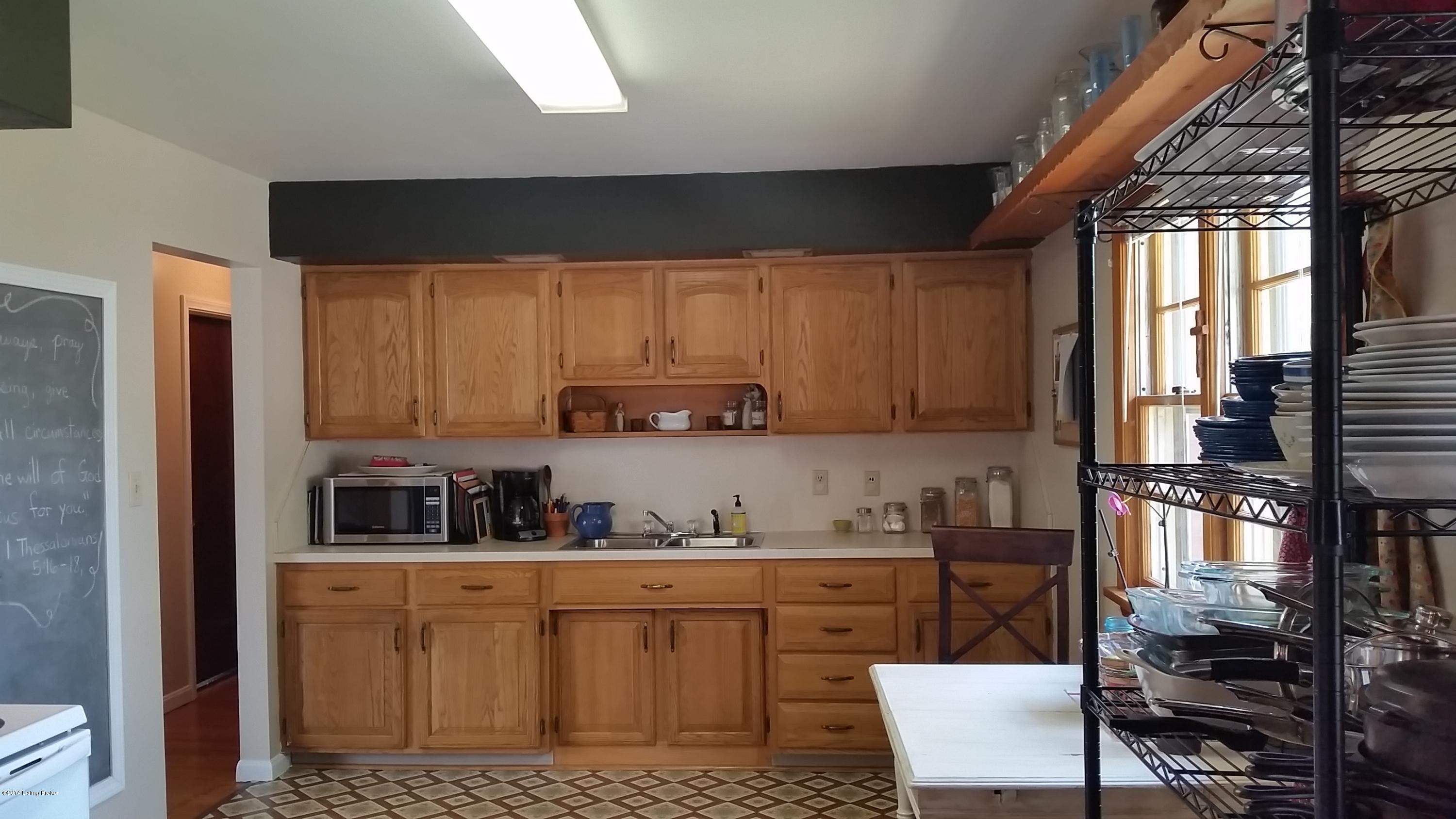 10808 Marcitis Road Louisville, KY 40272 - Photo 3 of 30 Amish-crafted Oak Cabinets