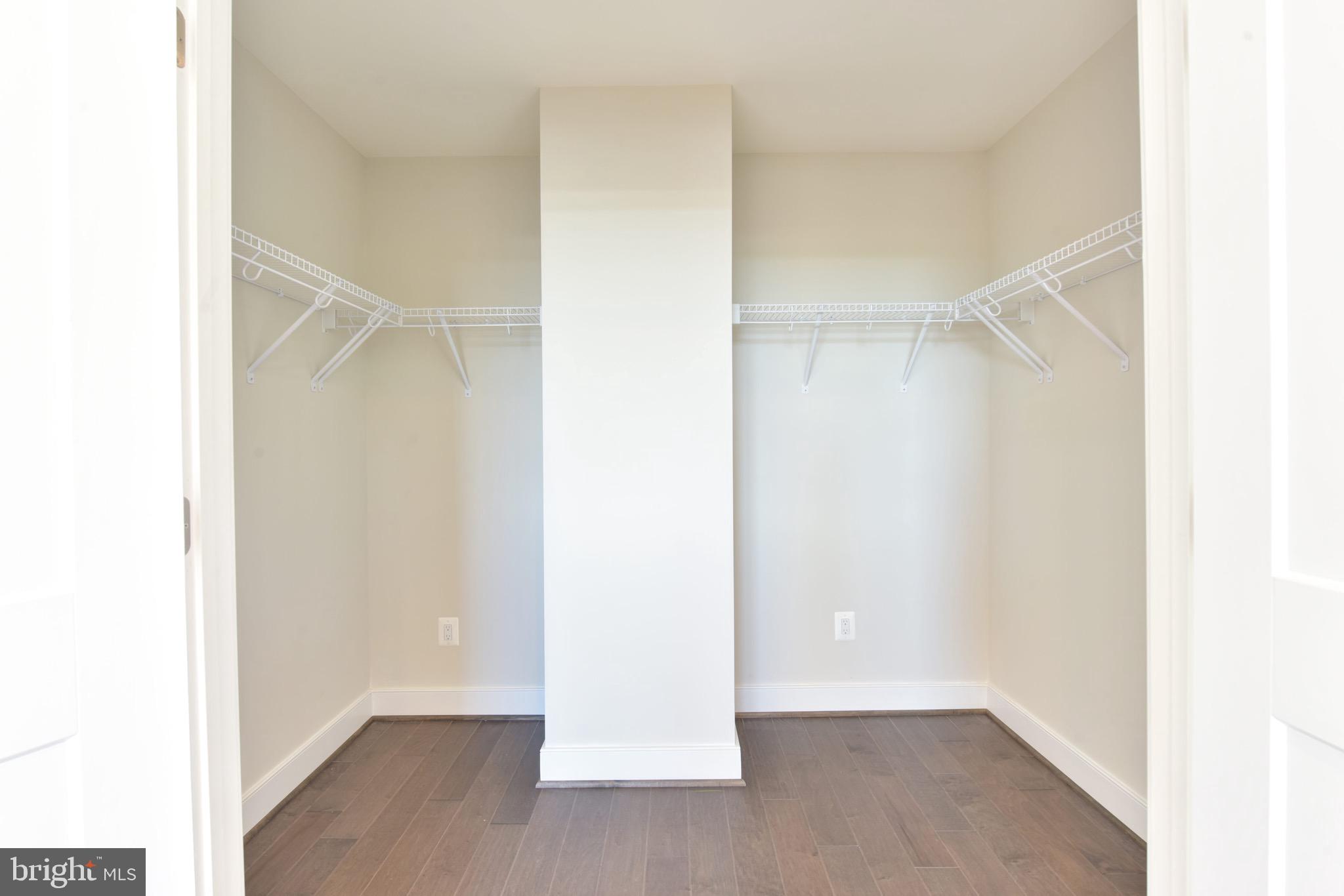 2815 24th Road South Arlington, VA 22206 - Photo 21 of 97 a view of an empty walk in closet with wooden floor