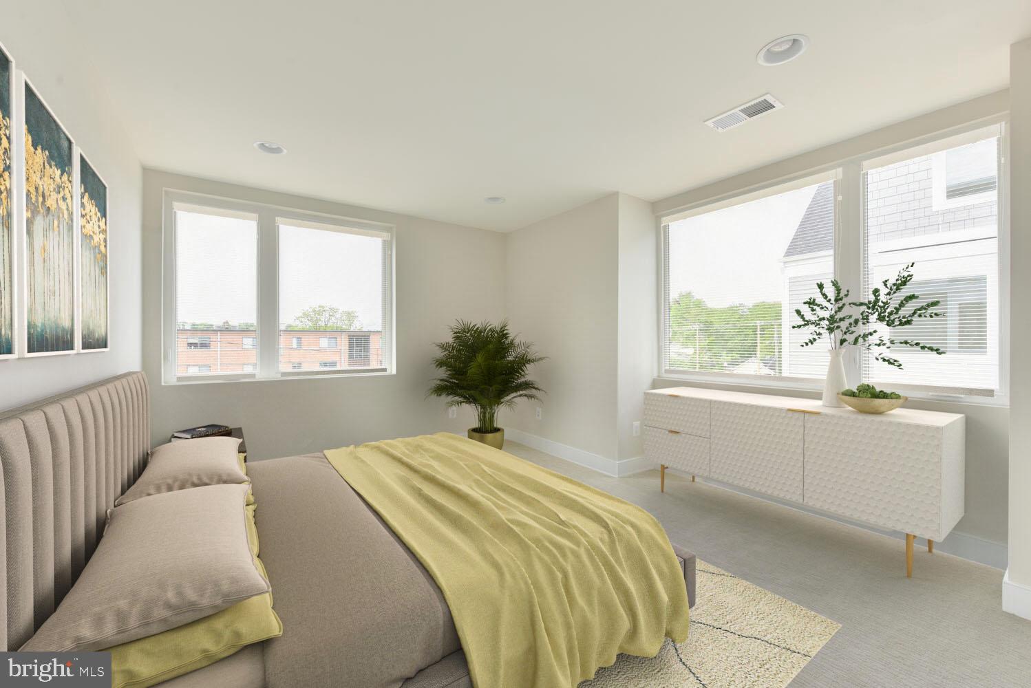 2815 24th Road South Arlington, VA 22206 - Photo 33 of 97 a bedroom with a large bed and a large window