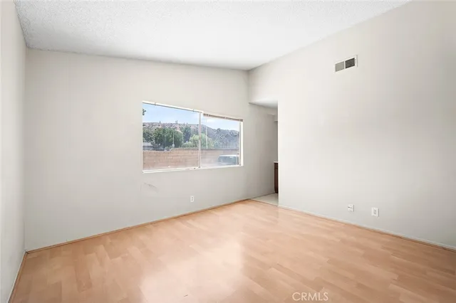 a bathroom with a toilet sink and shower