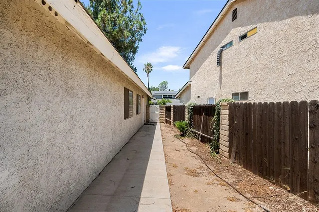 an aerial view of a house with a garden