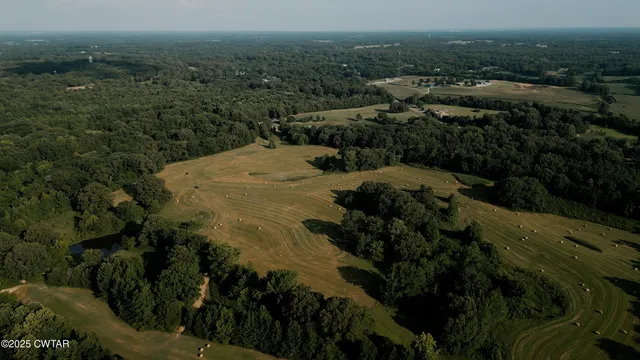 a view of a lake from a yard