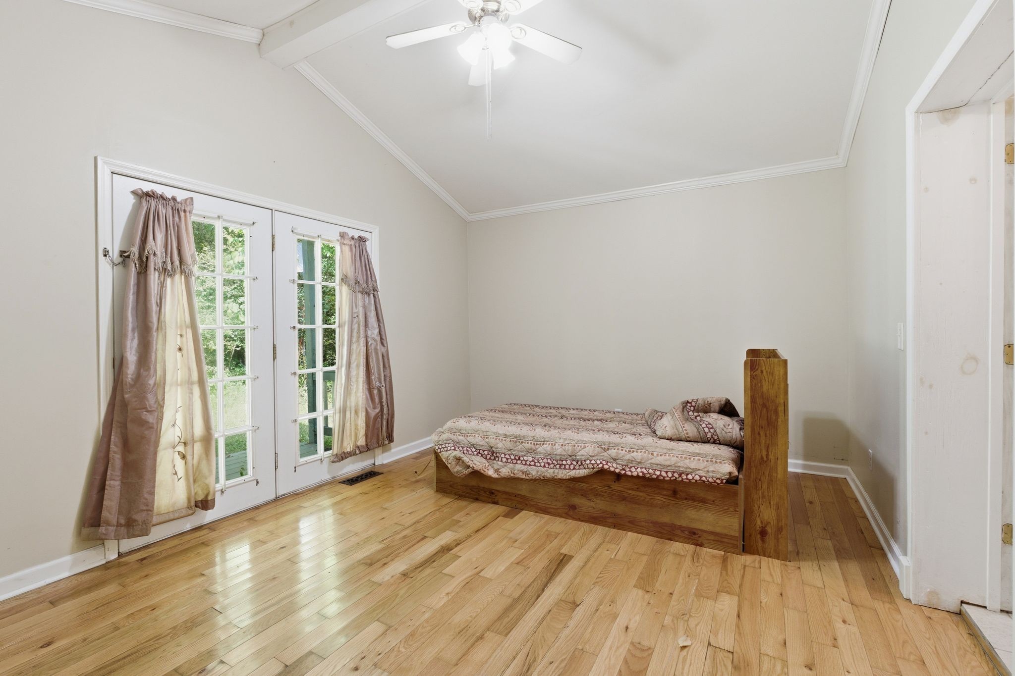 6603 Shedden Road Greenbrier, TN 37073 - Photo 12 of 30 a bedroom with a bed and a large window