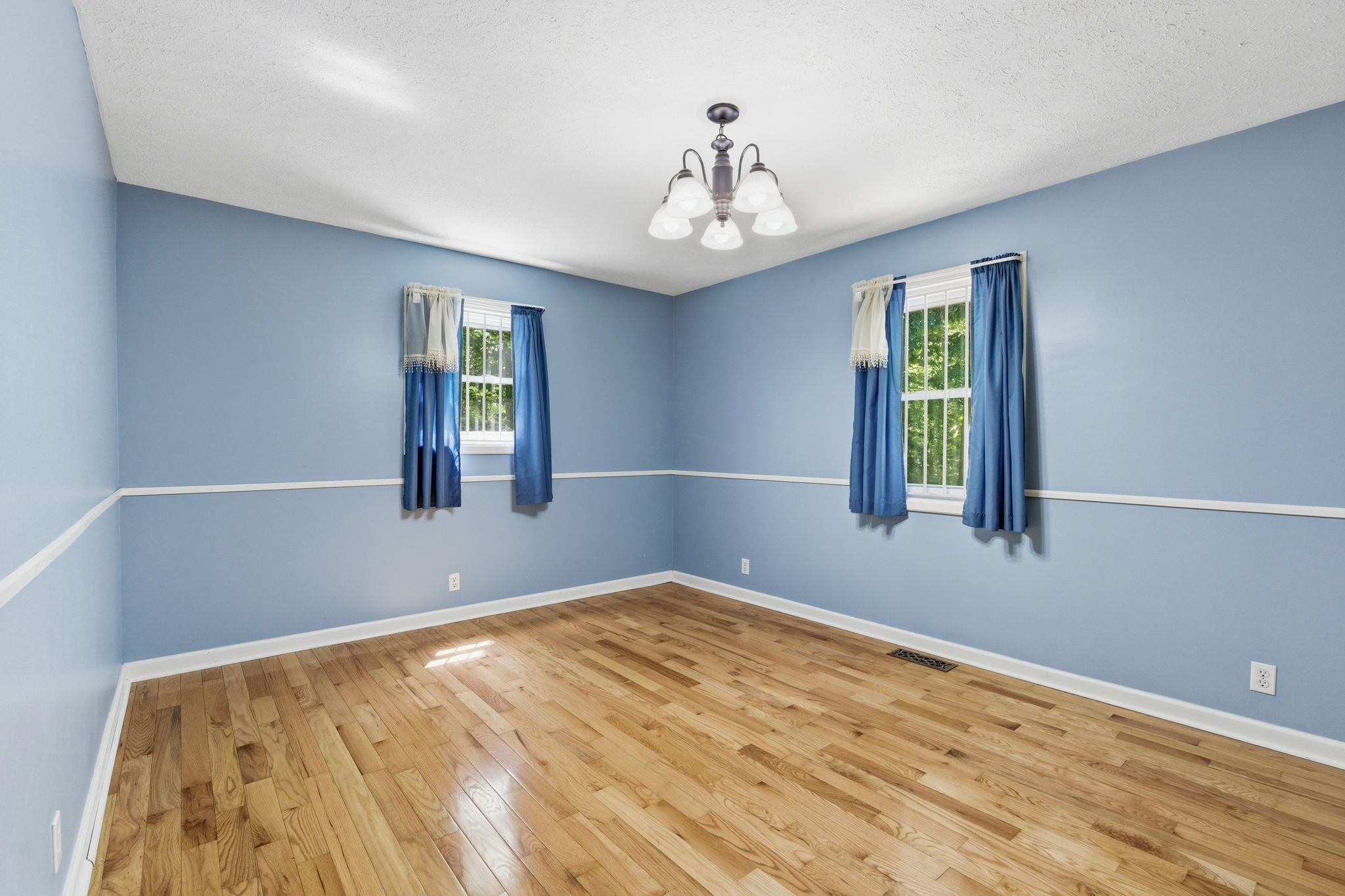 6603 Shedden Road Greenbrier, TN 37073 - Photo 22 of 30 a view of an empty room with window and wooden floor