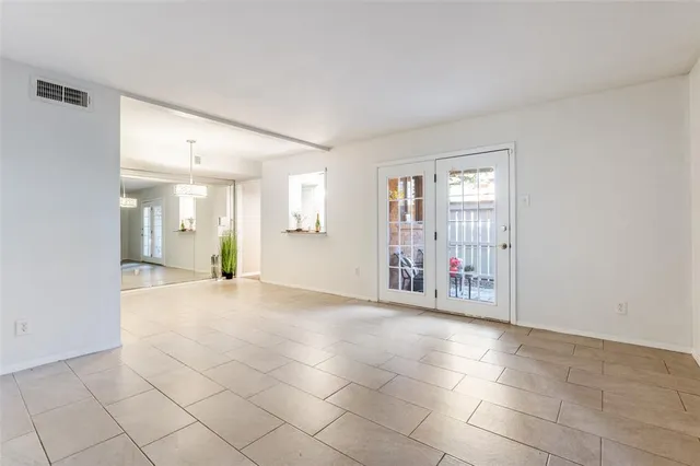 a view of an empty room with window