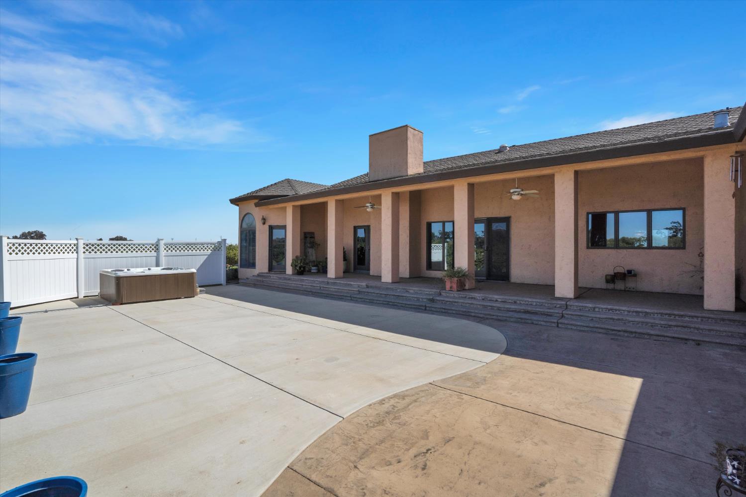 20170 River Road Stevinson, CA 95374 - Photo 70 of 77 front view of a house with a basket ball court