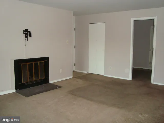 an empty room and windows