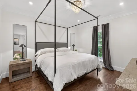a bathroom with a sink toilet and a mirror