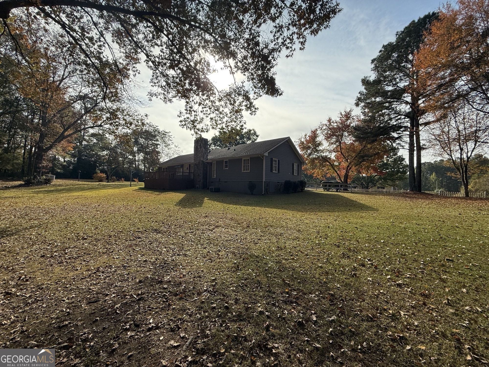 1084 Macedonia Road Newnan, GA 30263 - Photo 24 of 24 a view of a large yard with large trees