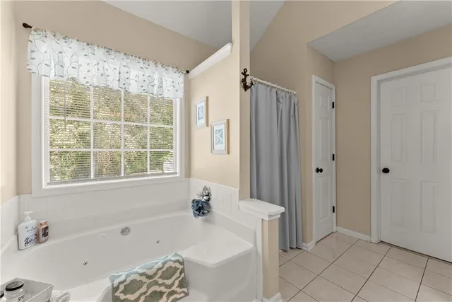 a bathroom with a sink a vanity and a mirror