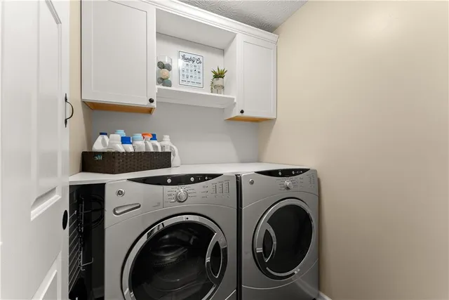 a work room with furniture and a window