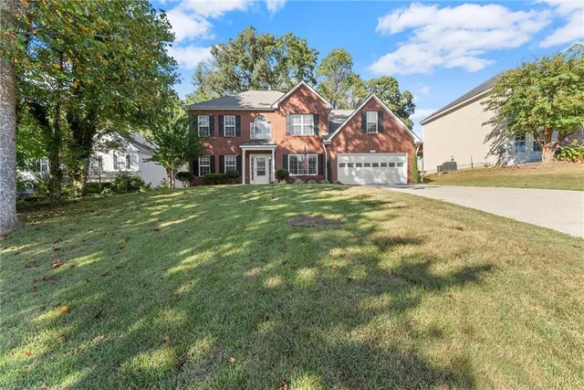 a swimming pool with wooden fence