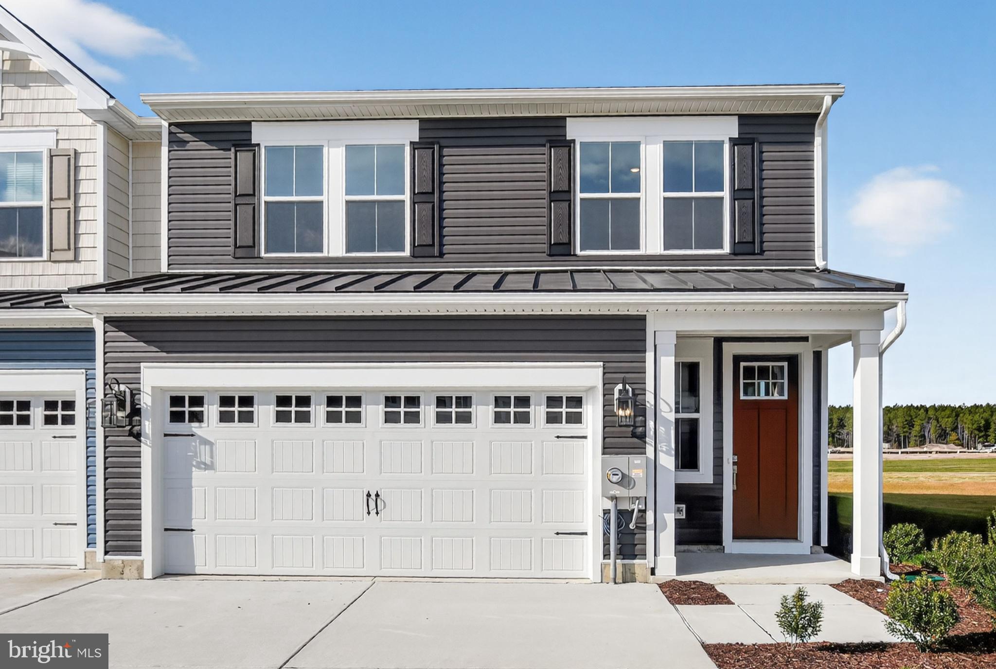 a front view of a building with windows