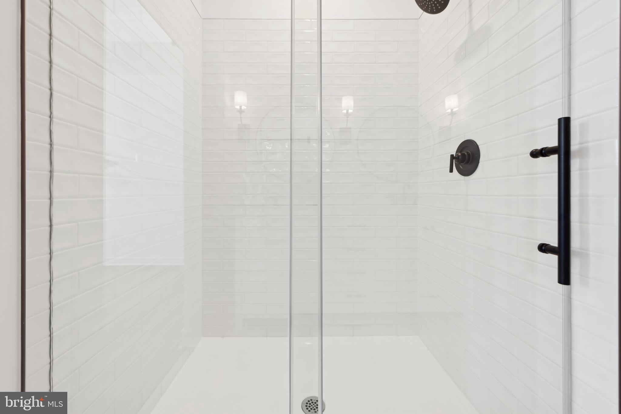 20430 Spyglass Circle Georgetown, DE 19947 - Photo 14 of 24 a bathroom with a shower