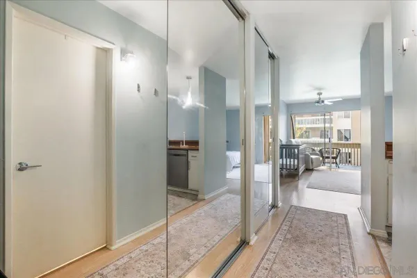 a bathroom with a glass shower door