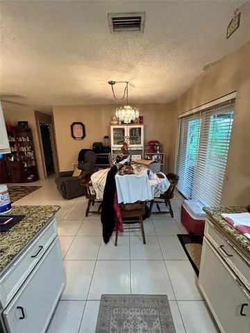 a bed room with a bed and a mirror