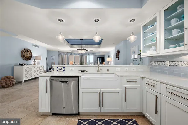 a bedroom with a bed and a lamp