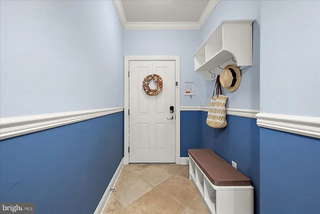 a terrace of a house with outdoor seating