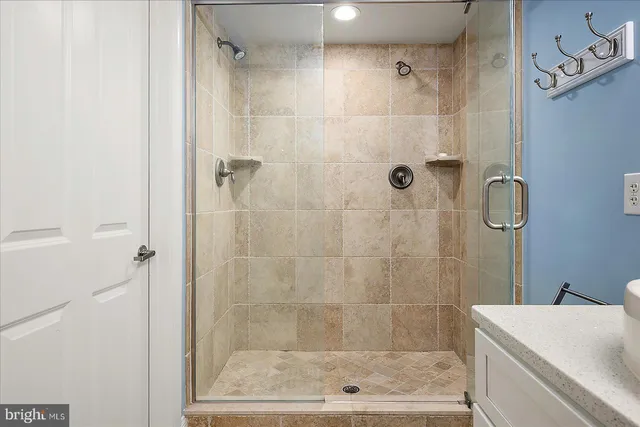 a bedroom with furniture and windows