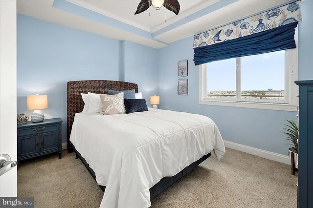 a view of staircase with white walls and windows