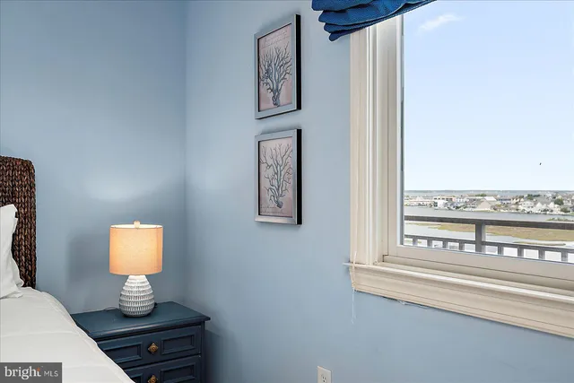 a view of a kitchen with furniture and windows