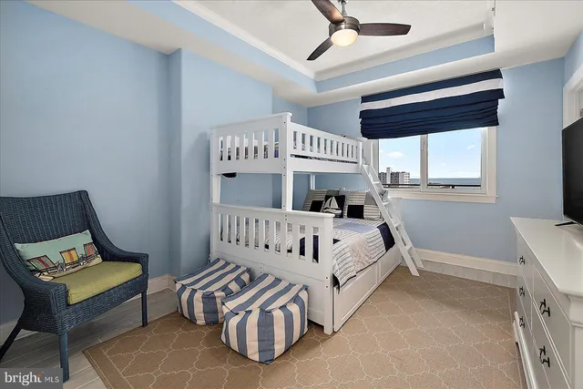 a balcony with table and chairs