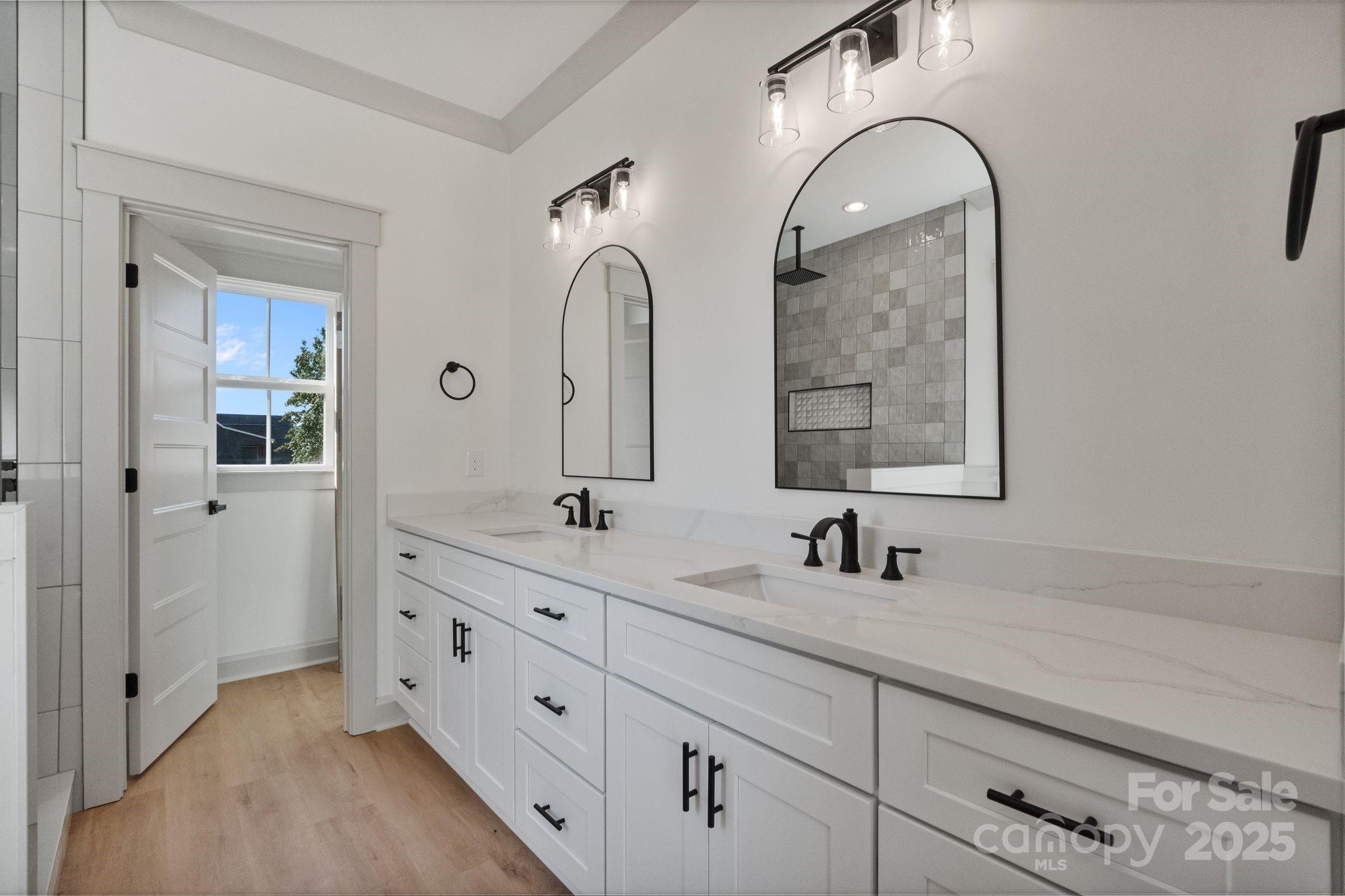 1050 Tom Joye Road Clover, SC 29710 - Photo 15 of 29 a bathroom with a double vanity sink mirror and