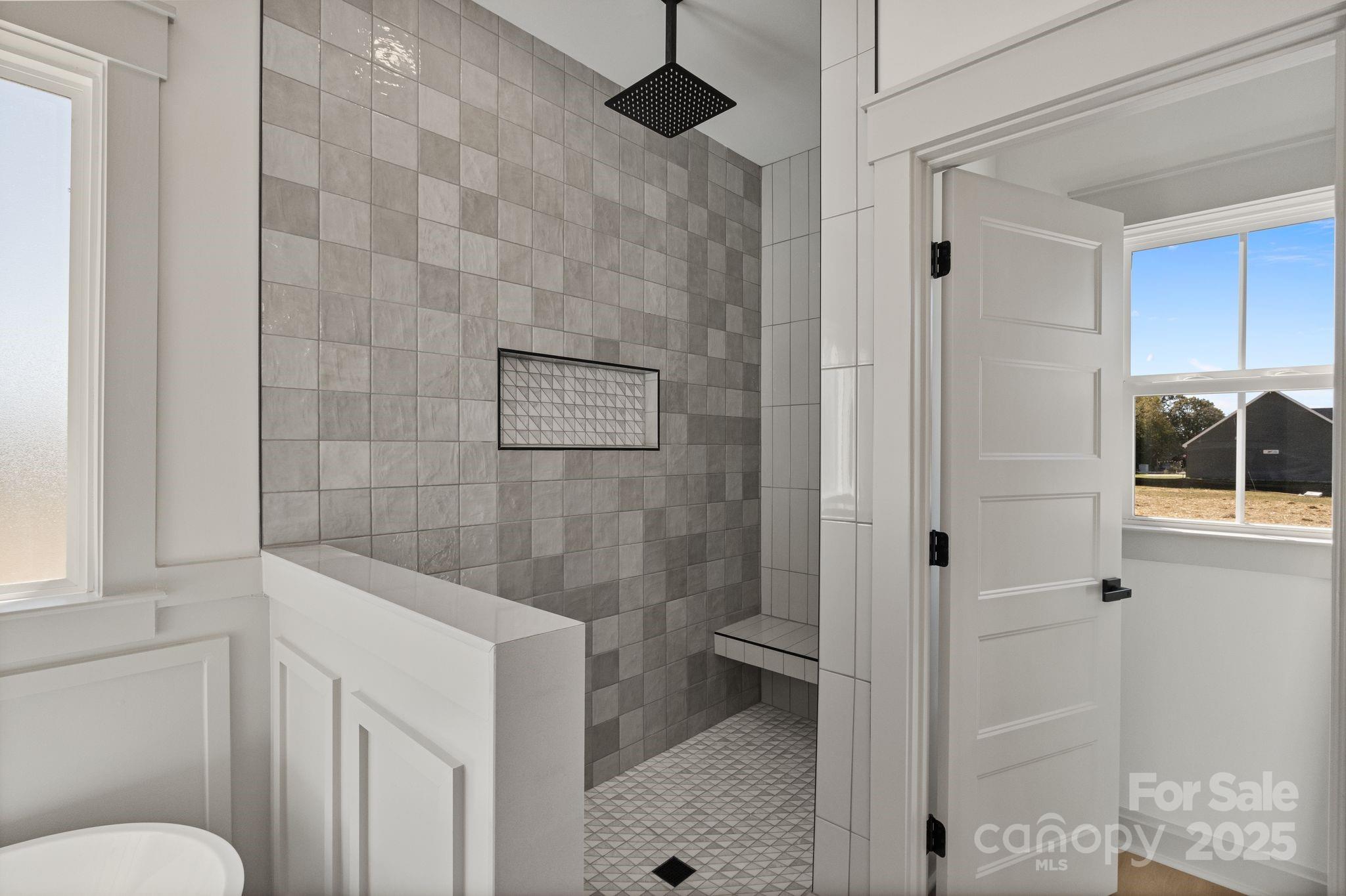 1050 Tom Joye Road Clover, SC 29710 - Photo 17 of 29 a bathroom with a toilet and a shower