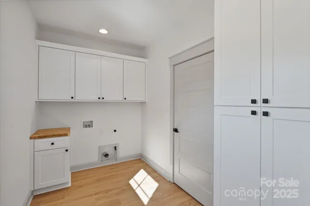 a view of kitchen with wooden floor