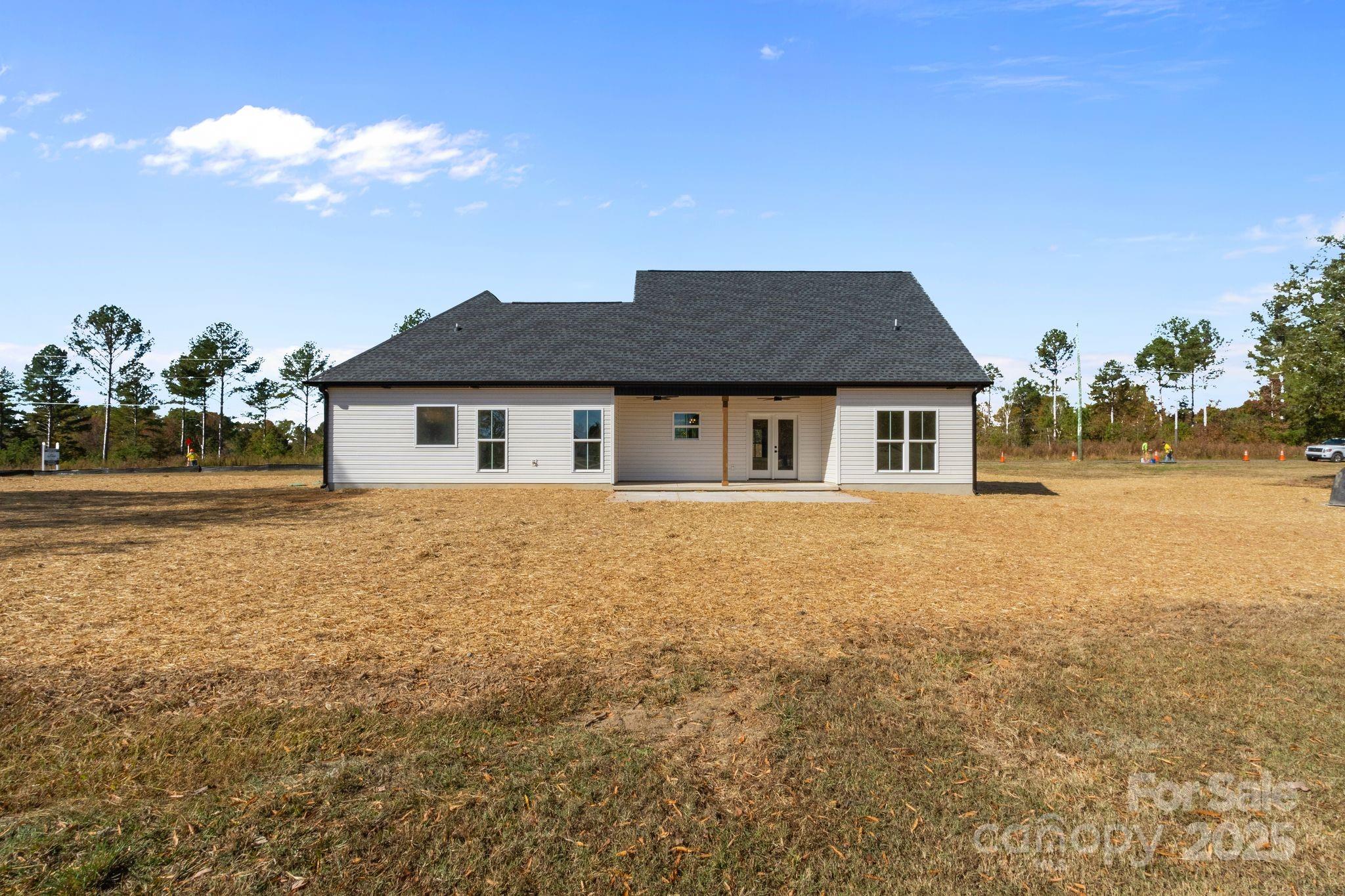 1050 Tom Joye Road Clover, SC 29710 - Photo 28 of 29 a house with trees in the background